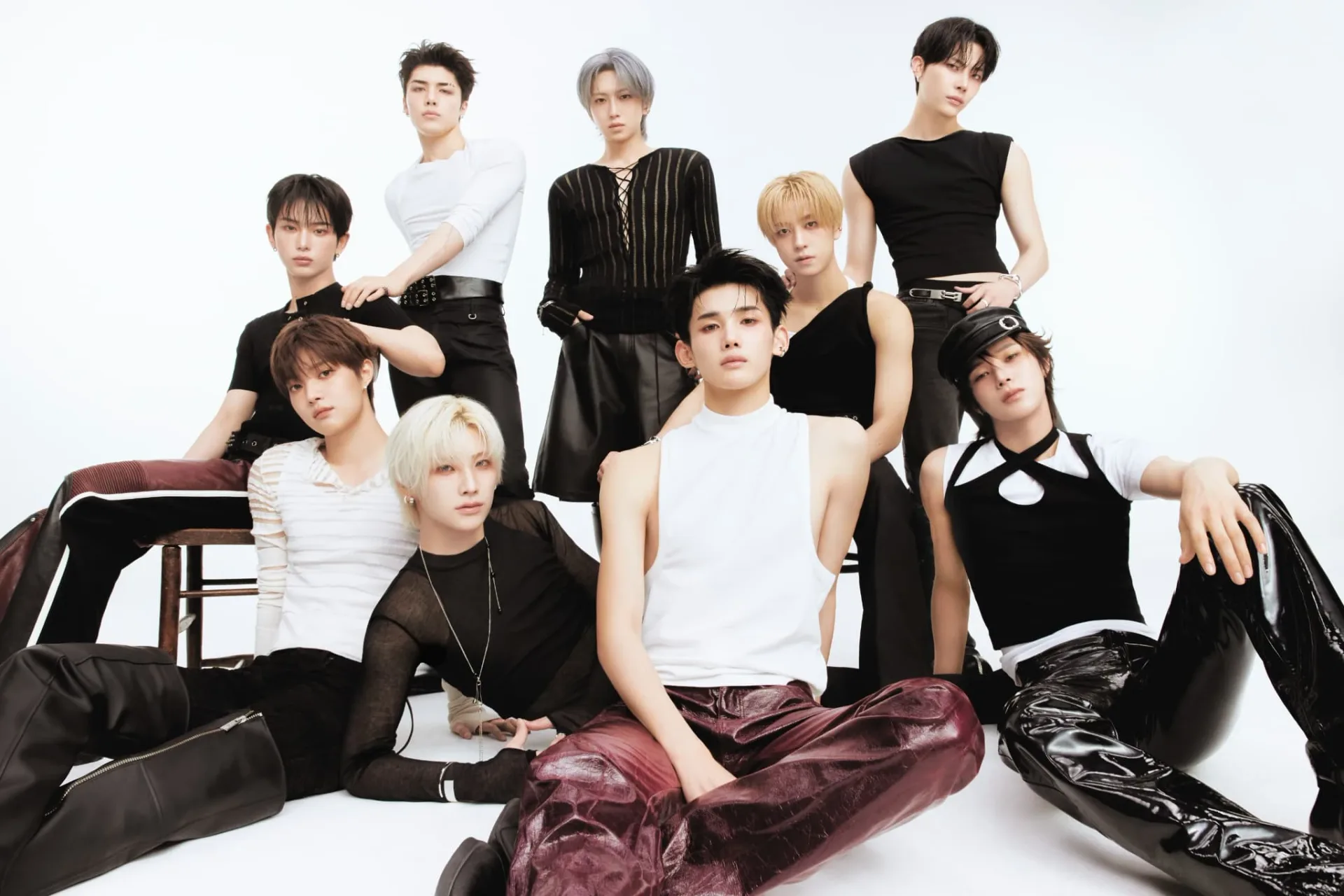 &TEAM — official nine-member group photograph