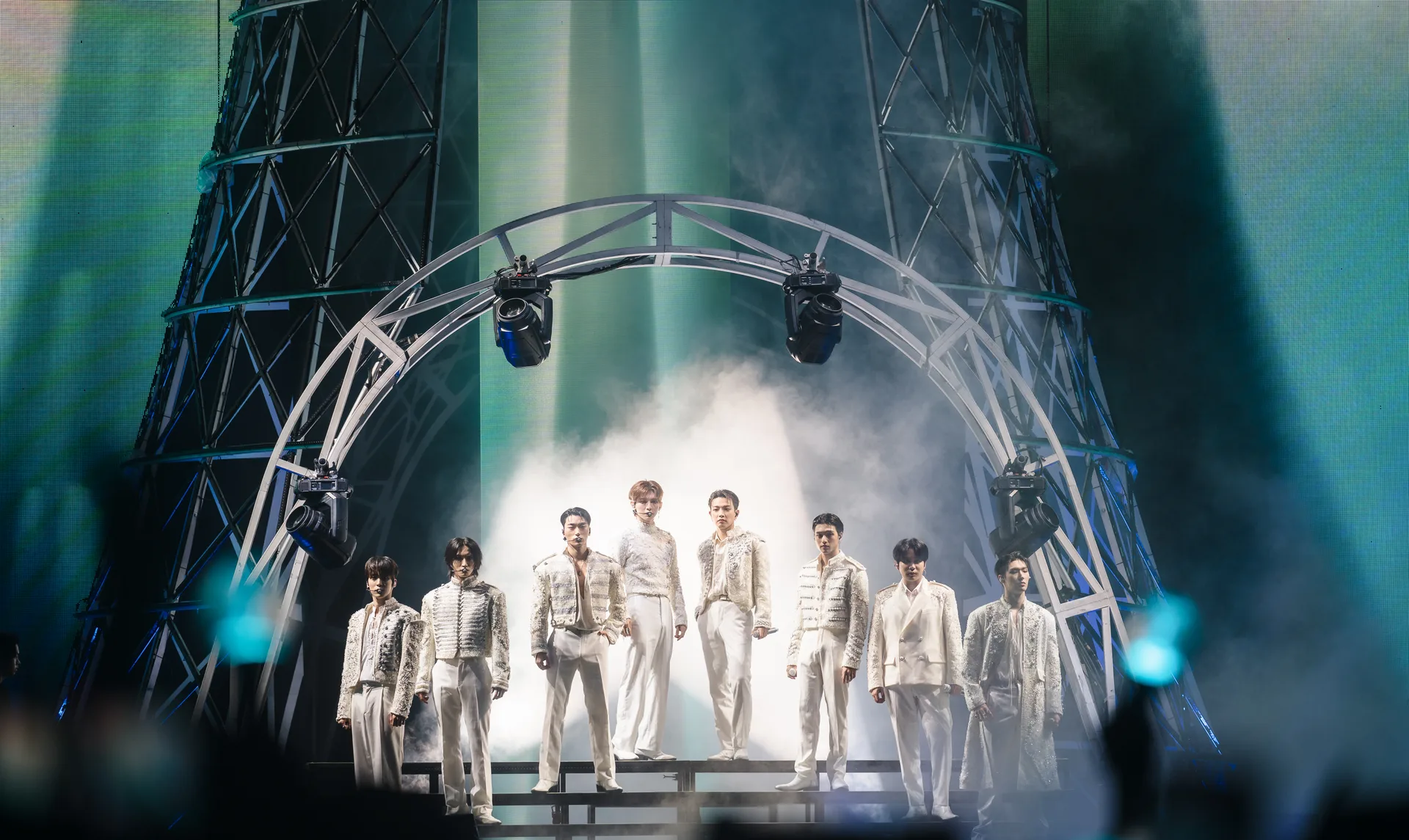 All eight members of ATEEZ performing together in August 2024