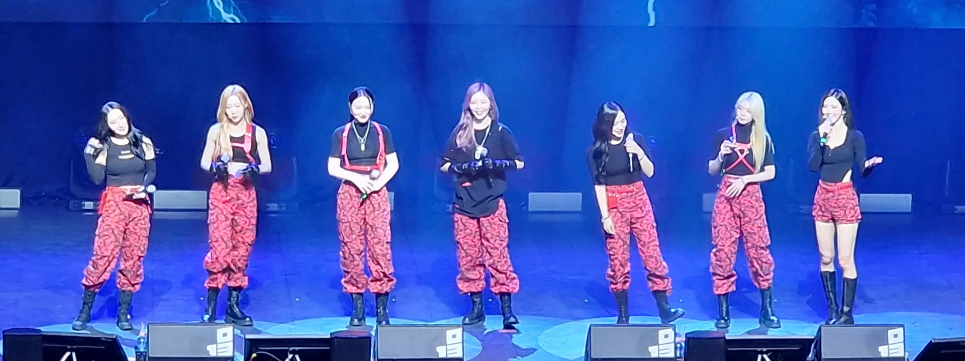 All seven Dreamcatcher members performing in Tilburg in 2022