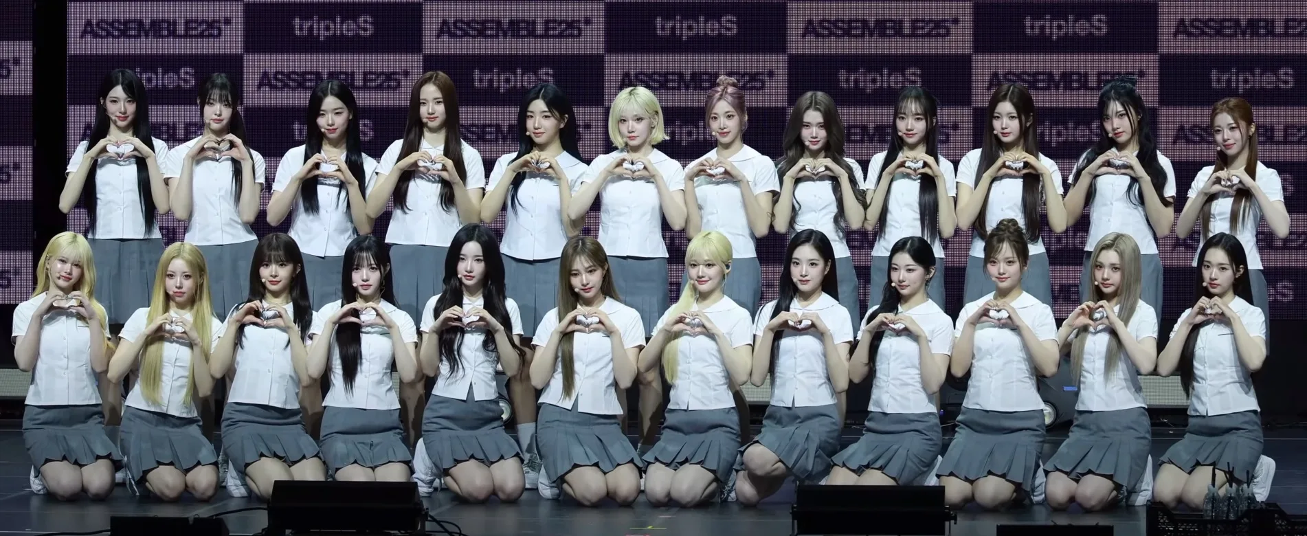All 24 members of tripleS at the Assemble25 showcase in May 2025