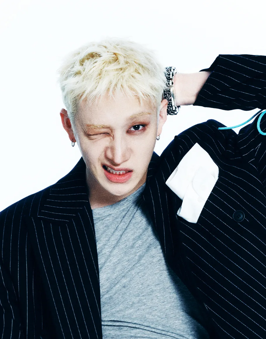 Bang Chan of Stray Kids in an official JYP studio portrait