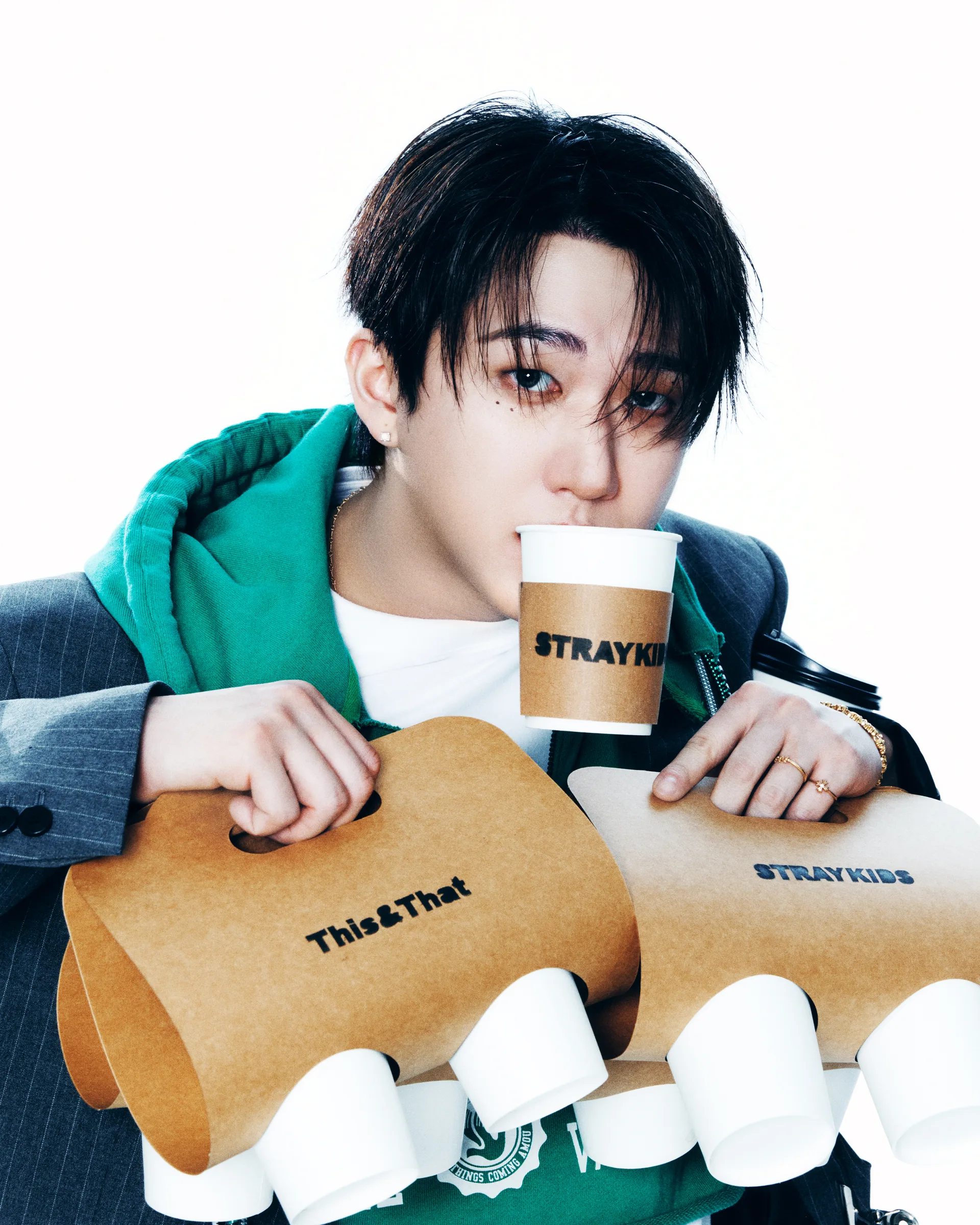 Changbin of Stray Kids in an official JYP studio portrait