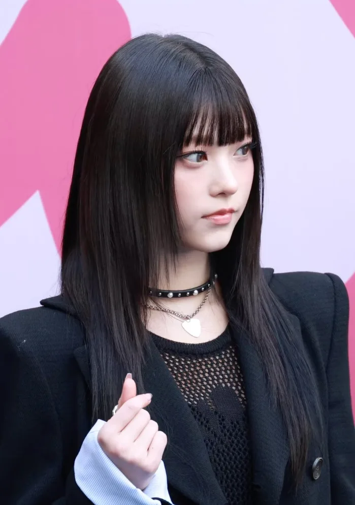 Haerin of NewJeans photographed at Seoul Fashion Week in February 2024