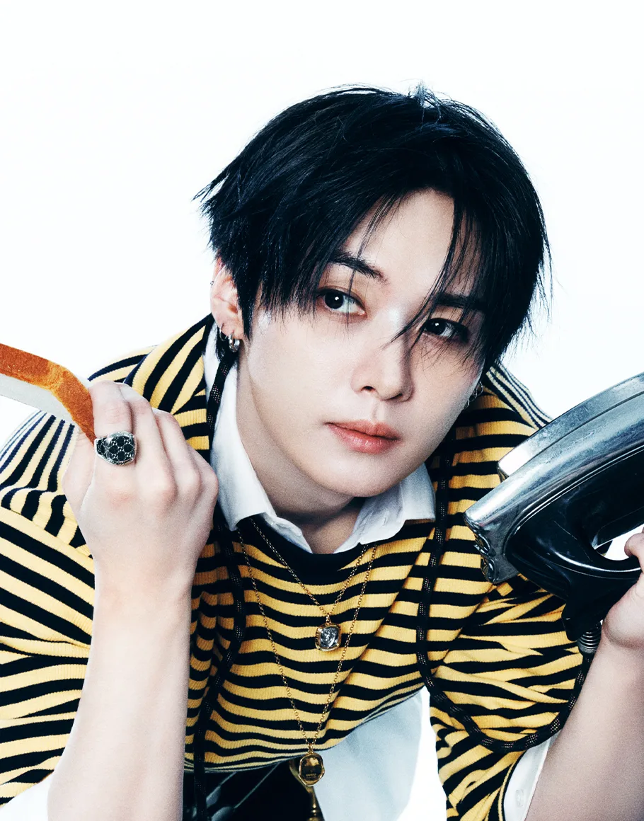 Lee Know of Stray Kids in an official JYP studio portrait