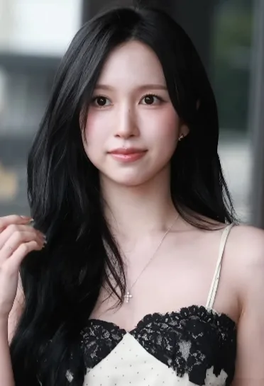 Mina of Twice at the airport in July 2026