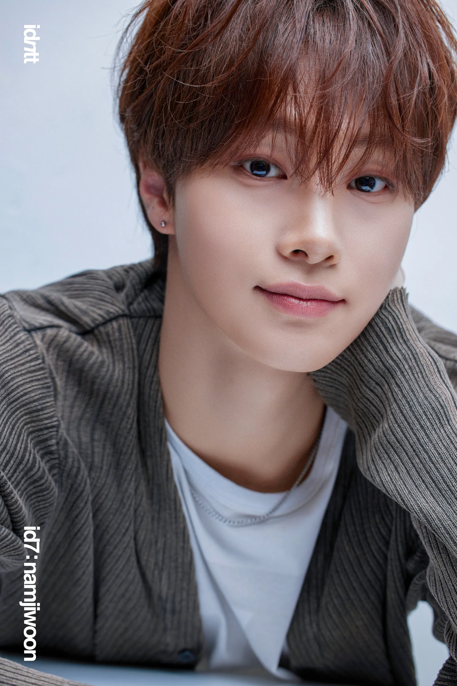 Nam JiWoon in an official 2025 debut portrait
