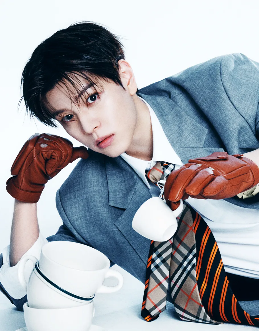 Seungmin of Stray Kids in an official JYP studio portrait