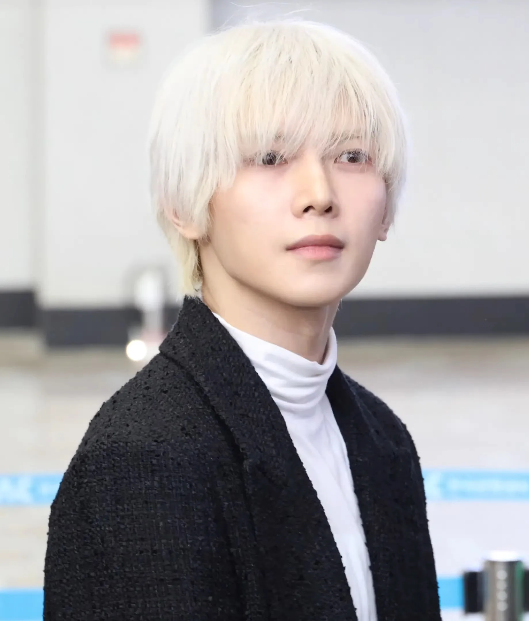 Yeosang of ATEEZ at Gimpo International Airport on December 12, 2025